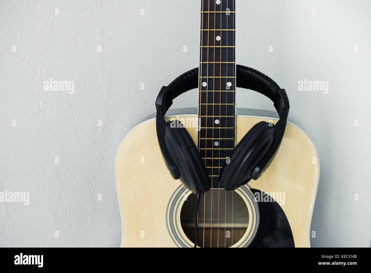acoustic guitar and headphones Stock Photo