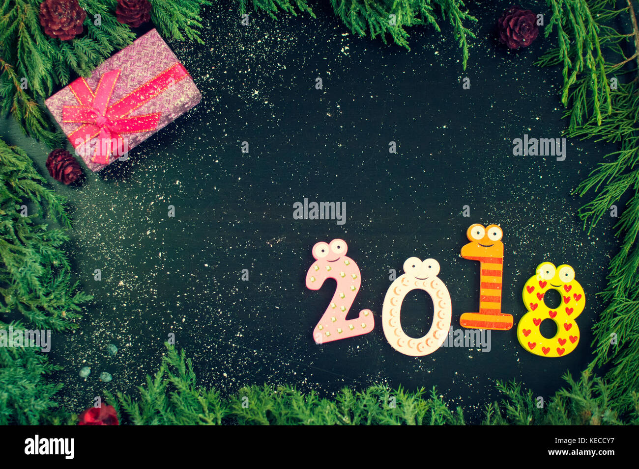 New Year composition with fir-trees, cones and candles Stock Photo - Alamy