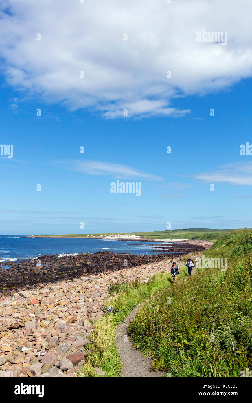 John O'Groats, Scotland. Walkers on footpath from John O'Groats to Duncansby Head, the actual most north easterly point in mainland UK. Stock Photo