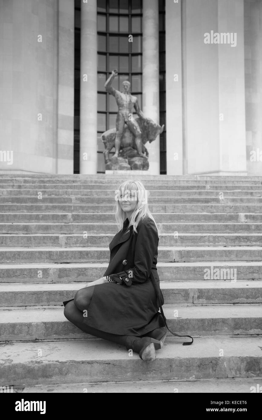 Young blond woman posing on the Trocadéro square in Paris, France Stock Photo