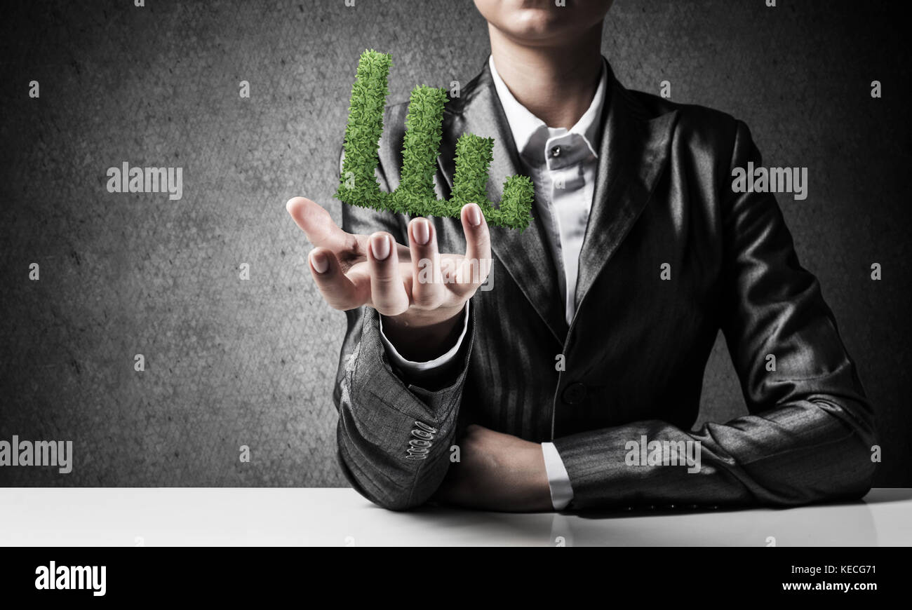 Businessman presenting growing graph Stock Photo - Alamy