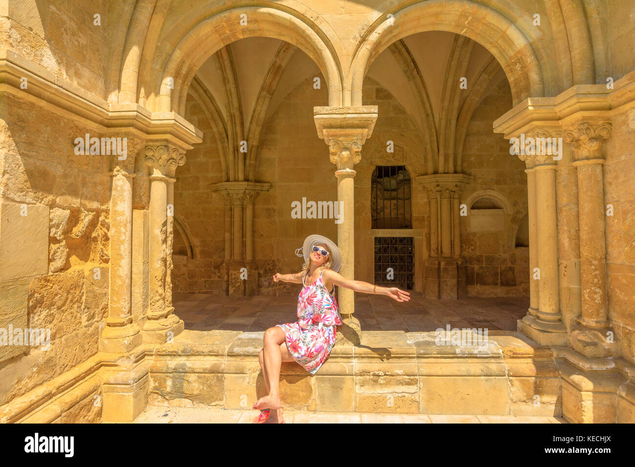 Happy tourist visits Coimbra Stock Photo