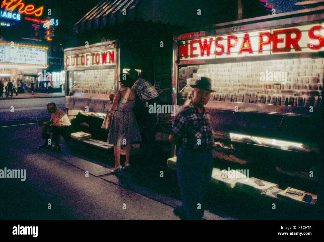 Newspaper Stand at Night, New York City, New York, USA, July 1961 Stock Photo