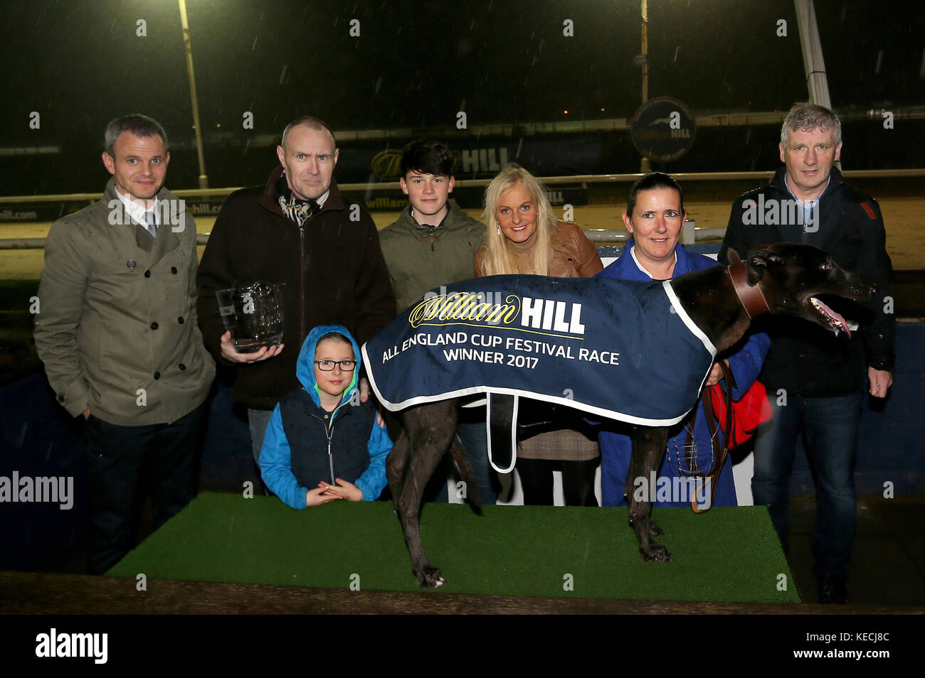 Droopys Verve with connections A Harrison and The Conlon Family after winning the second race at  Newcastle during the William Hill All England Cup Festival at Newcastle Greyhound Stadium. PRESS ASSOCIATION Photo. Picture date: Thursday October 19, 2017. Photo credit should read: Richard Sellers/PA Wire Stock Photo