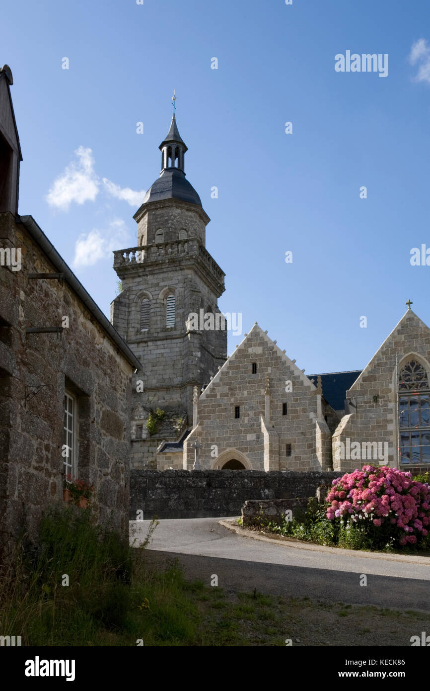 St-Gilles-Pligeaux, Côtes-d'Armor, Brittany, France: church tower and village square on a quiet Summer's day Stock Photo
