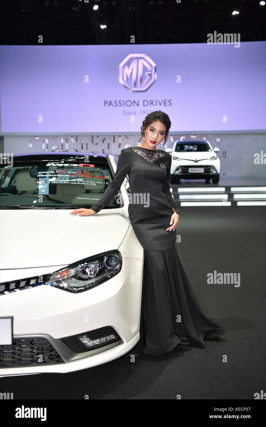 NONTHABURI - MARCH 28: Unidentified model with MG 6 car on display at The 38th Bangkok International Thailand Motor Show 2017 on March 28, 2017 Nontha Stock Photo