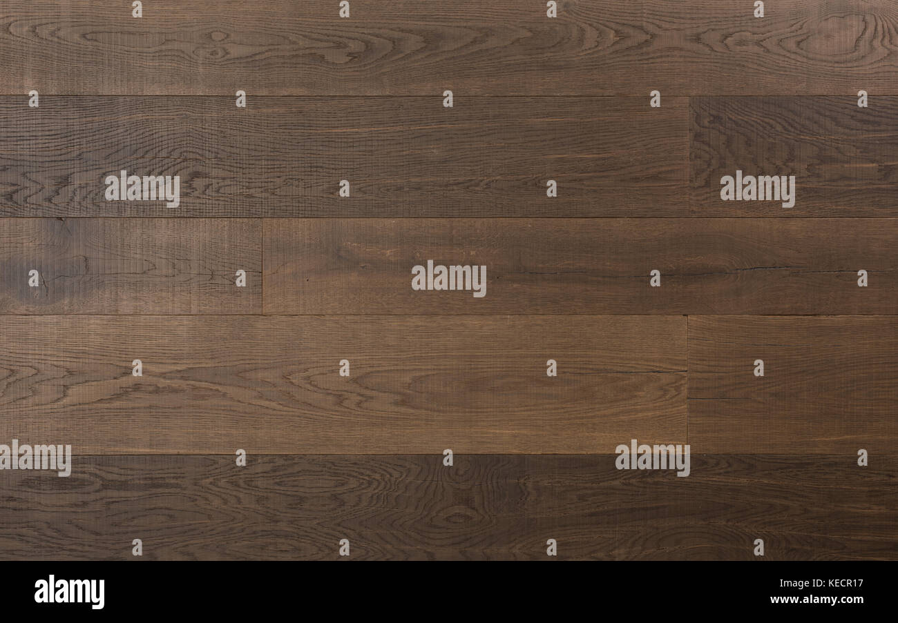 Elegant hardwood flooring made of dark textured wood planks Stock Photo