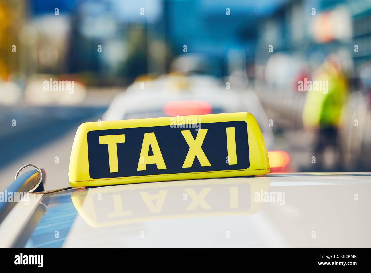 Taxi cars on the street in sunny day. Prague, Czech Republic Stock Photo