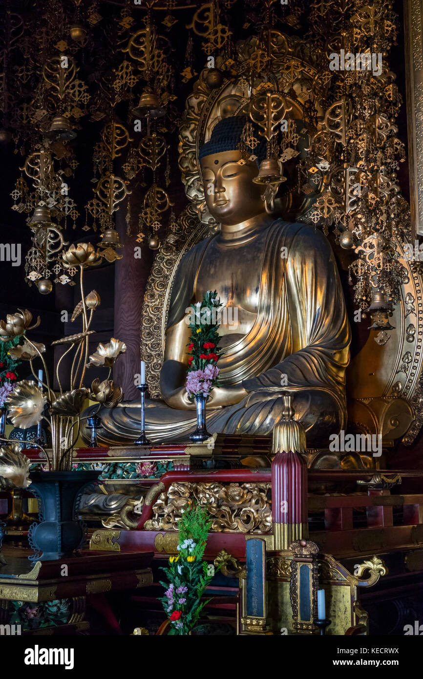 Kyoto, Japan - May 18, 2017: Golden Buddha in Chion-In Temple Kyoto, Japan  Chion-in in Higashiyama-ku, Kyoto, Japan is the headquarters of the Jodo-s Stock Photo