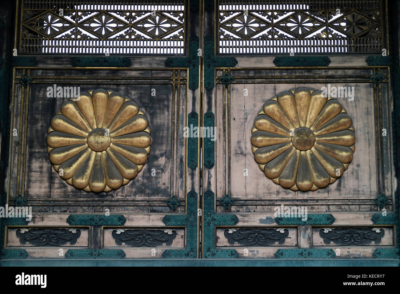 Kyoto, Japan -  May 23, 2017: Golden Imperial Chrysanthemums as decoration on the doors of the Chrysanthemum Gate of the Higashi Honganji Temple in Ky Stock Photo