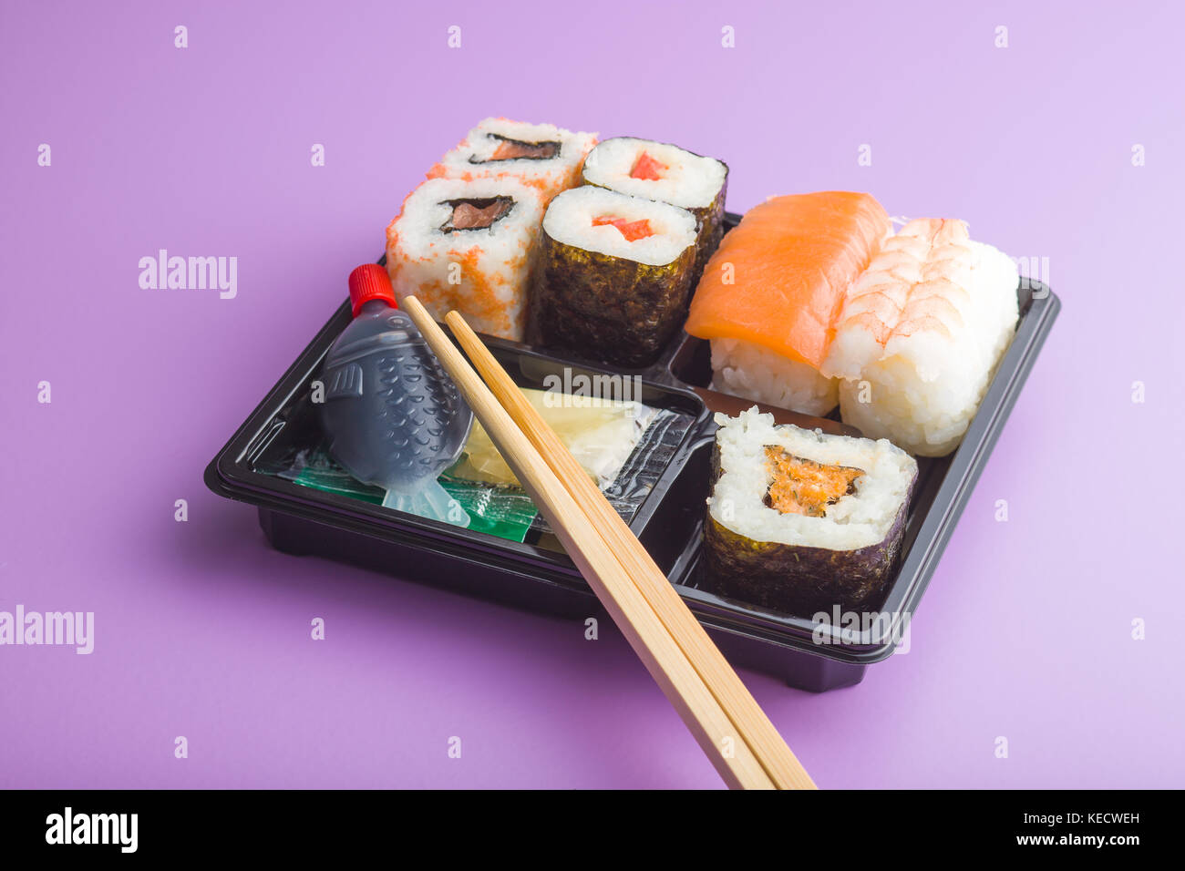 Eating set of sushi in box. Different types of sushi. Stock Photo