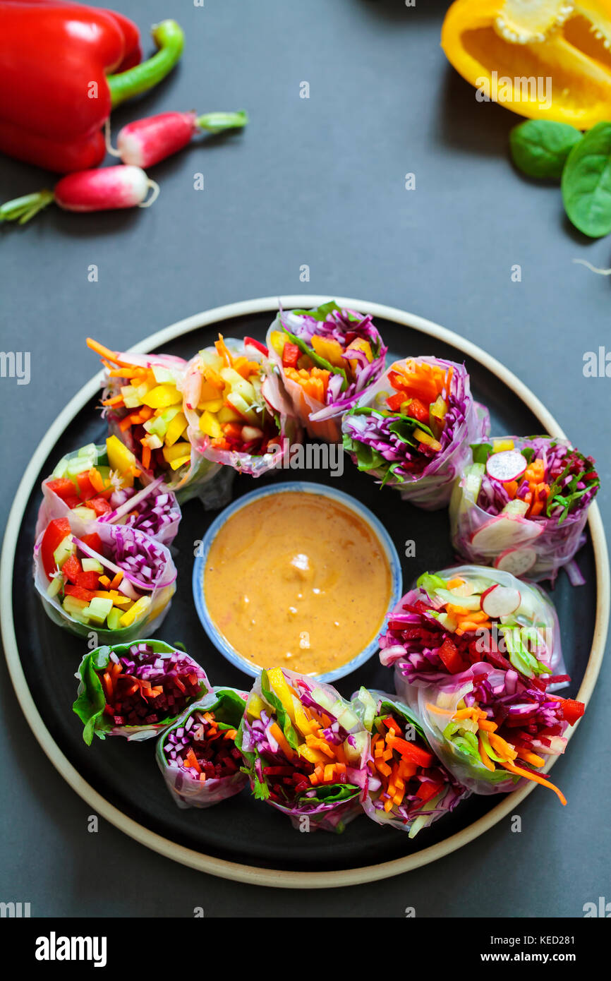 Vegan rice paper rolls with peanut butter sauce Stock Photo Alamy