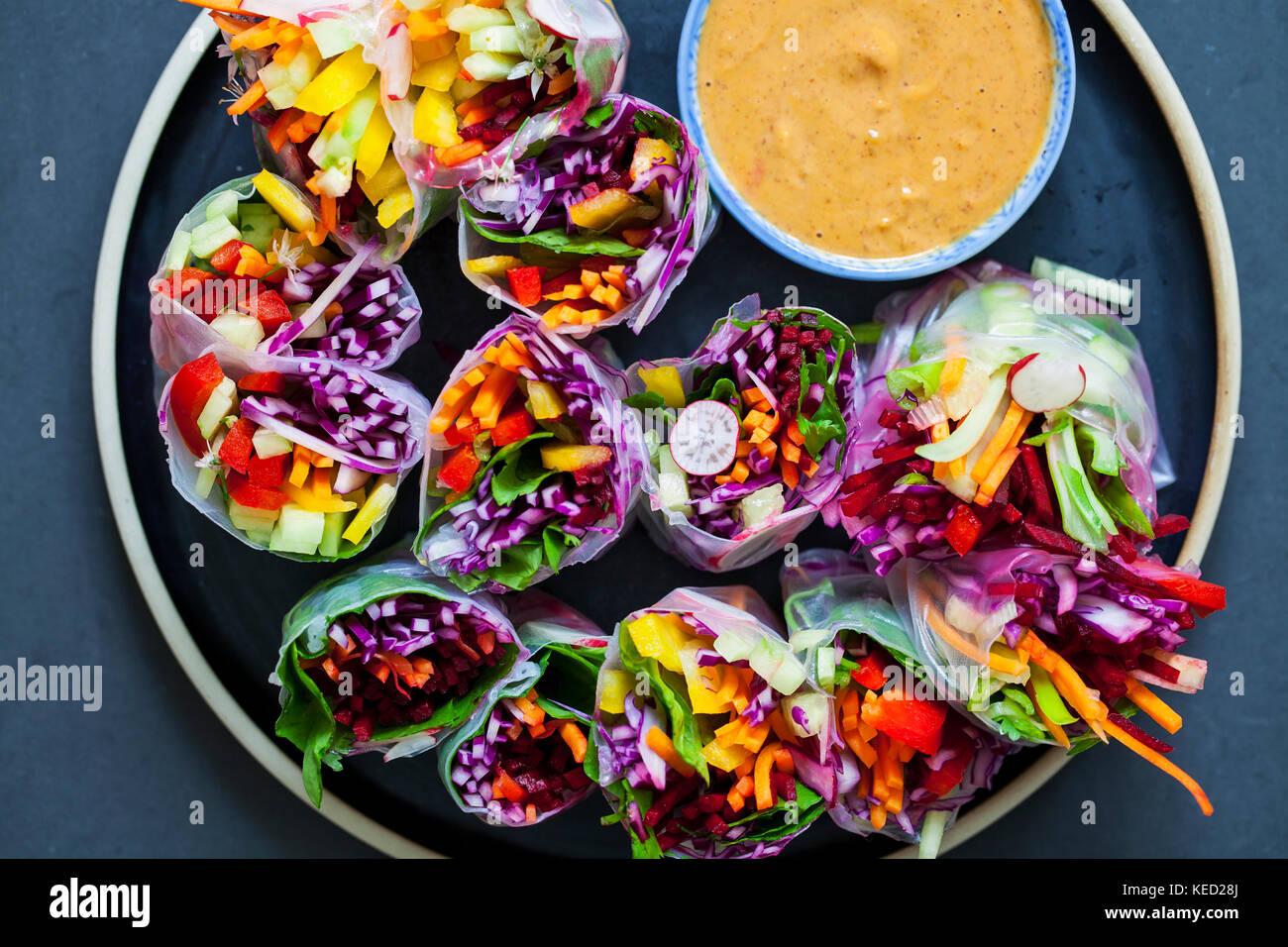 Vegan rice paper rolls with peanut butter sauce Stock Photo Alamy