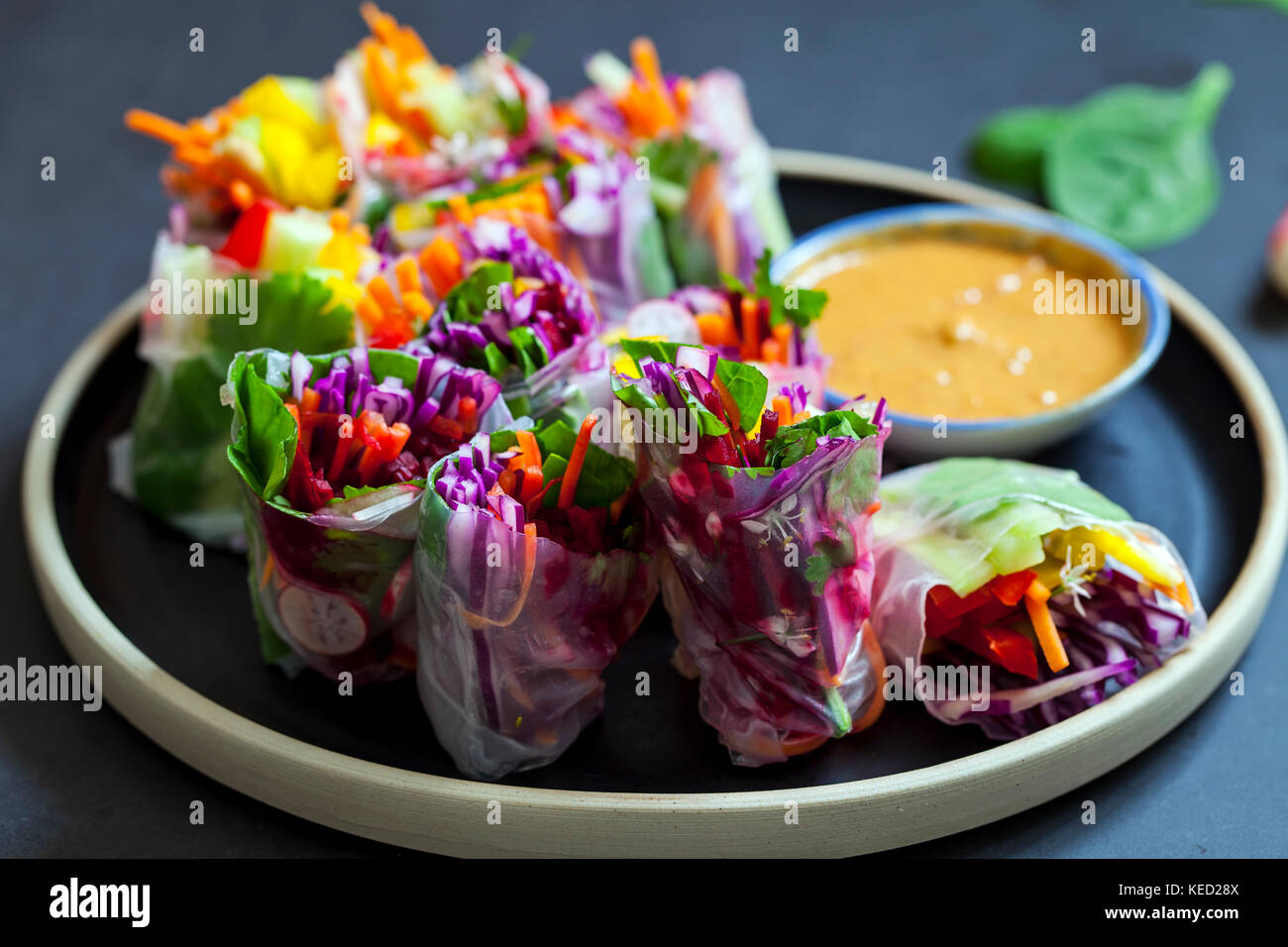 Vegan rice paper rolls with peanut butter sauce Stock Photo Alamy