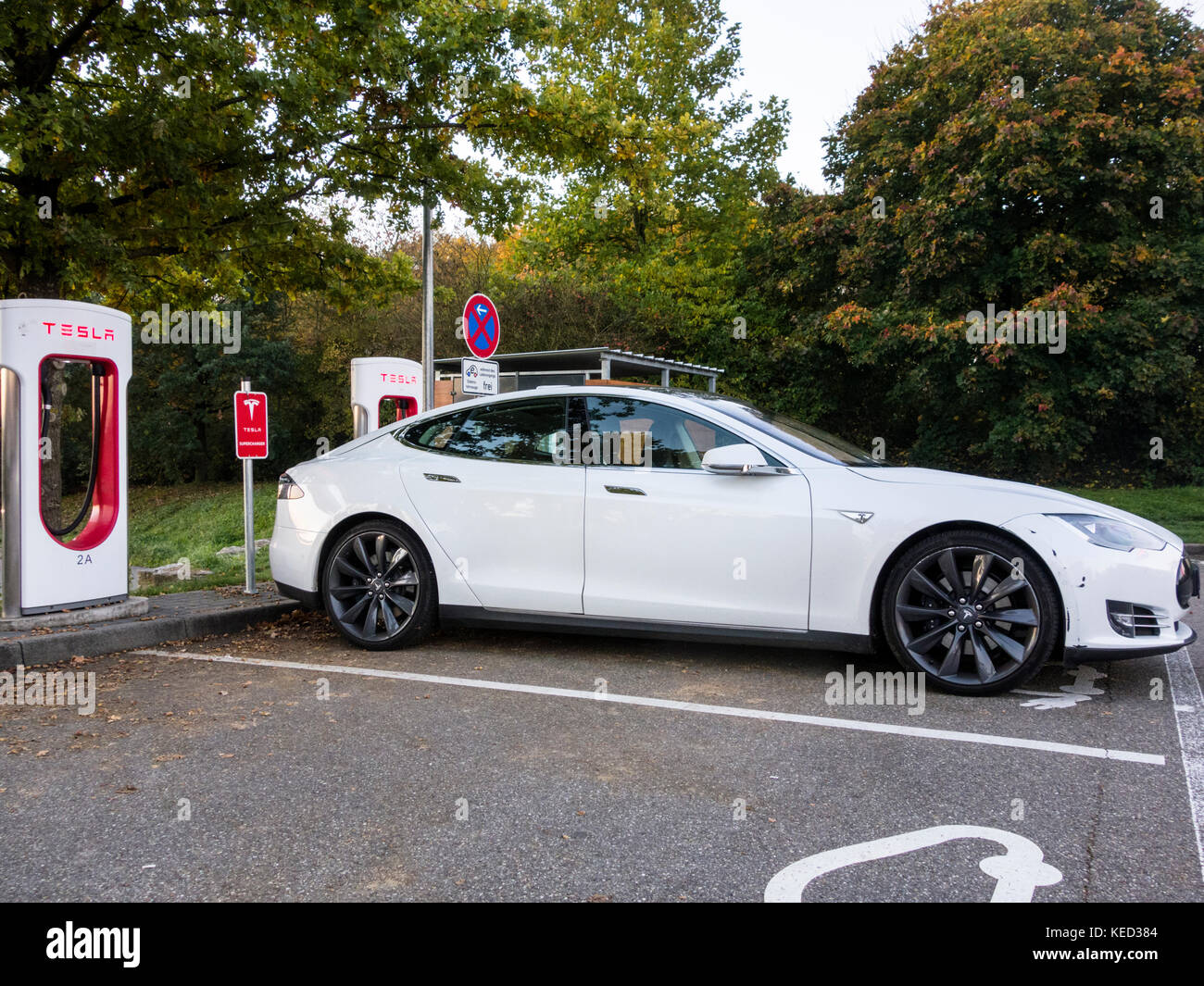 Tesla Model S being charged at a petrol station in Bavaria, Southern ...