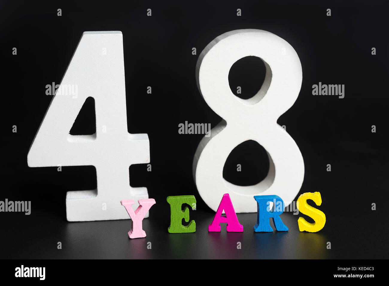 Letters and numbers-forty-eight on a black isolated background Stock ...