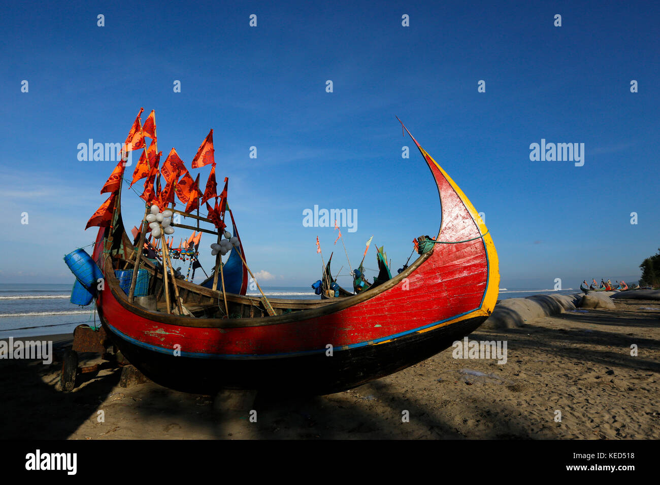 Fishing boats on Inani Sea Beach in Teknaf. It is a part of the Cox's Bazaar Sea Beach, the longest sea beach in the world. Teknaf, Cox´s Bazar, Bangl Stock Photo