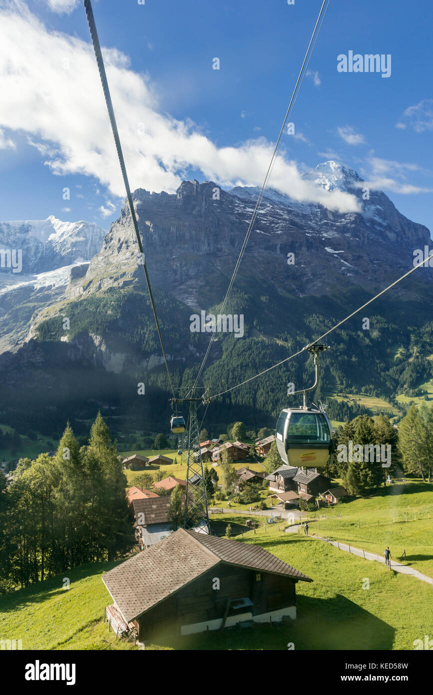 Mountain railway to Grindelwald First, snowcovered Eiger north face at