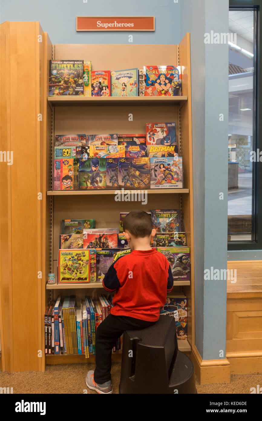 young boy reading in Barnes and Noble bookstore MA Stock Photo Alamy