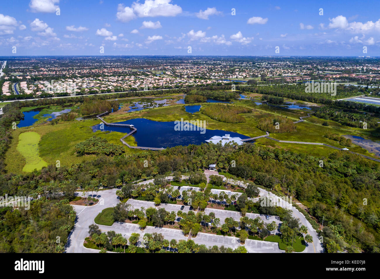 Florida Boynton Beach,Green Cay Nature Center & Wetlands,aerial overhead view,residential neighborhood houses homes,parking lot,car park,FL17092842d Stock Photo