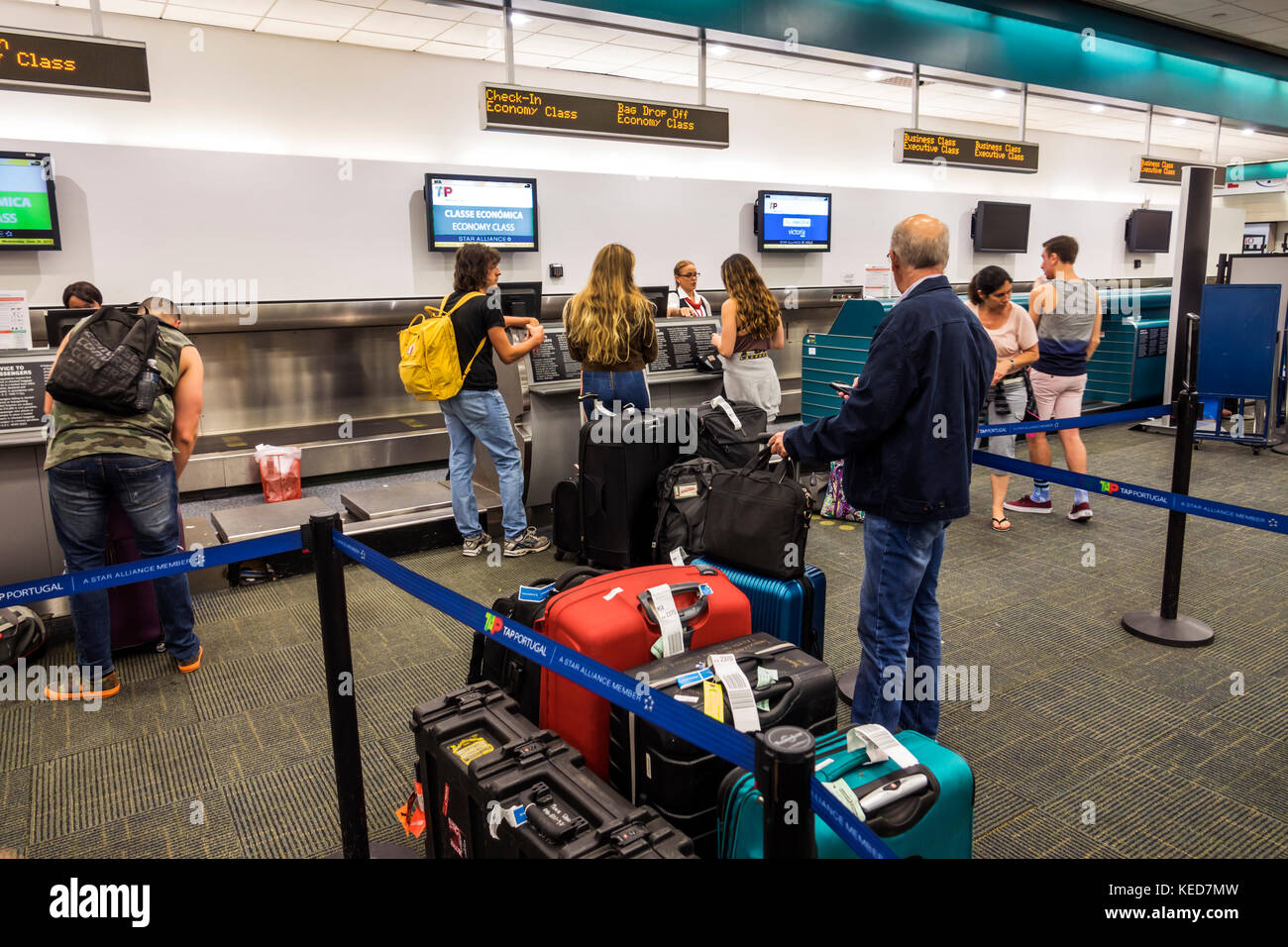 Florida,FL South,Miami,MIA,Miami International Airport,terminal,TAP Air  Portugal,airline carrier,ticket counter,luggage,check-in,line,queue,passenger  Stock Photo - Alamy