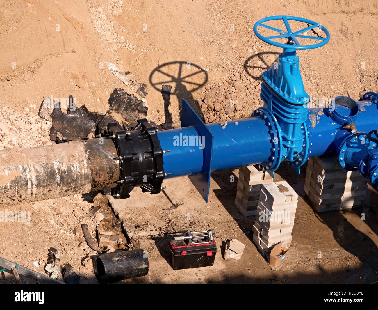 Gate valves underground, water pipeline valve on a blue pipeline after complete reconstruction