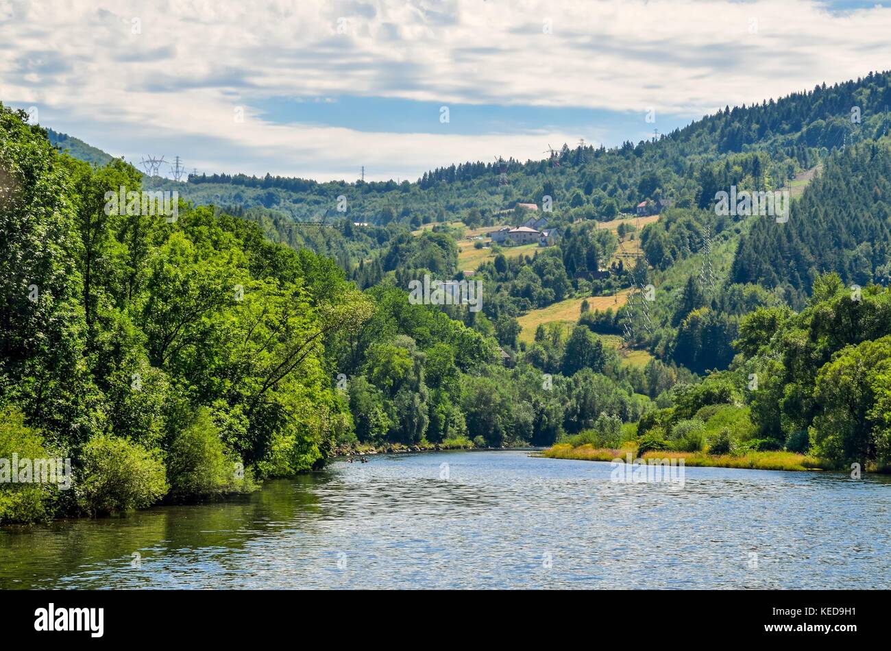Summer mountain landscape. River and village in the mountains Stock ...
