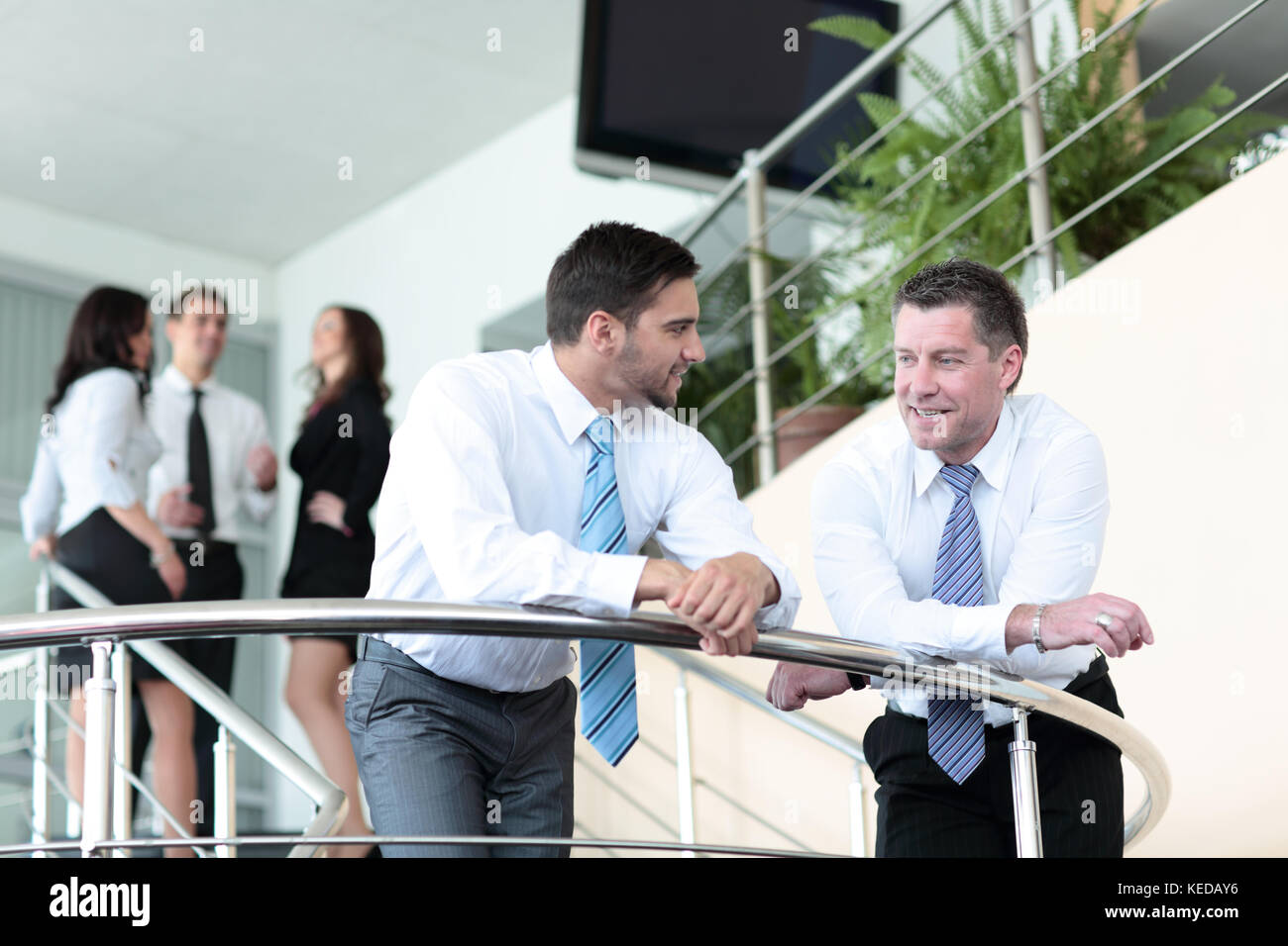 Business people team working in the modern office Stock Photo - Alamy