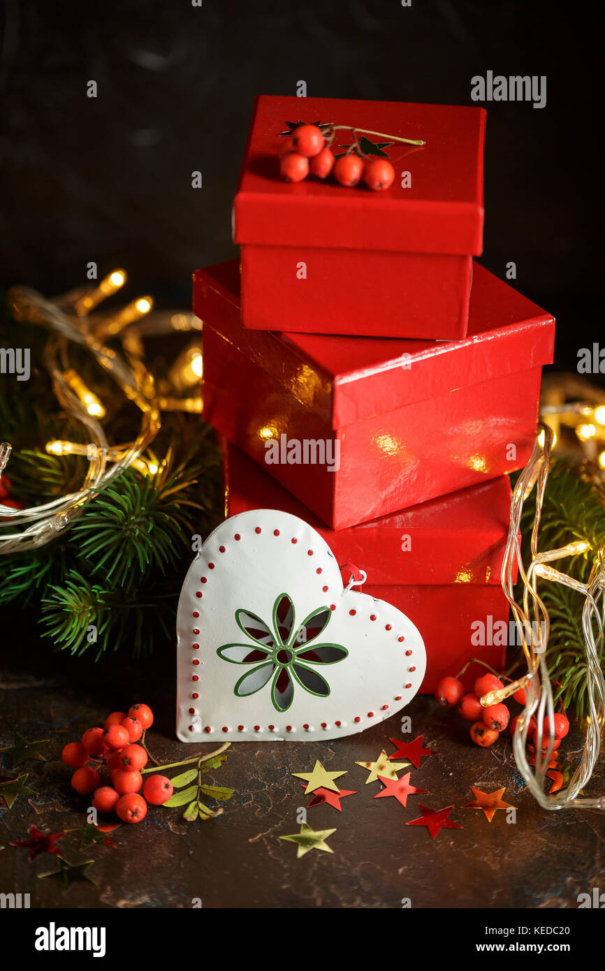 Christmas decorations with lights, toys and gifts on a dark background, New Year and Christmas decoration Stock Photo