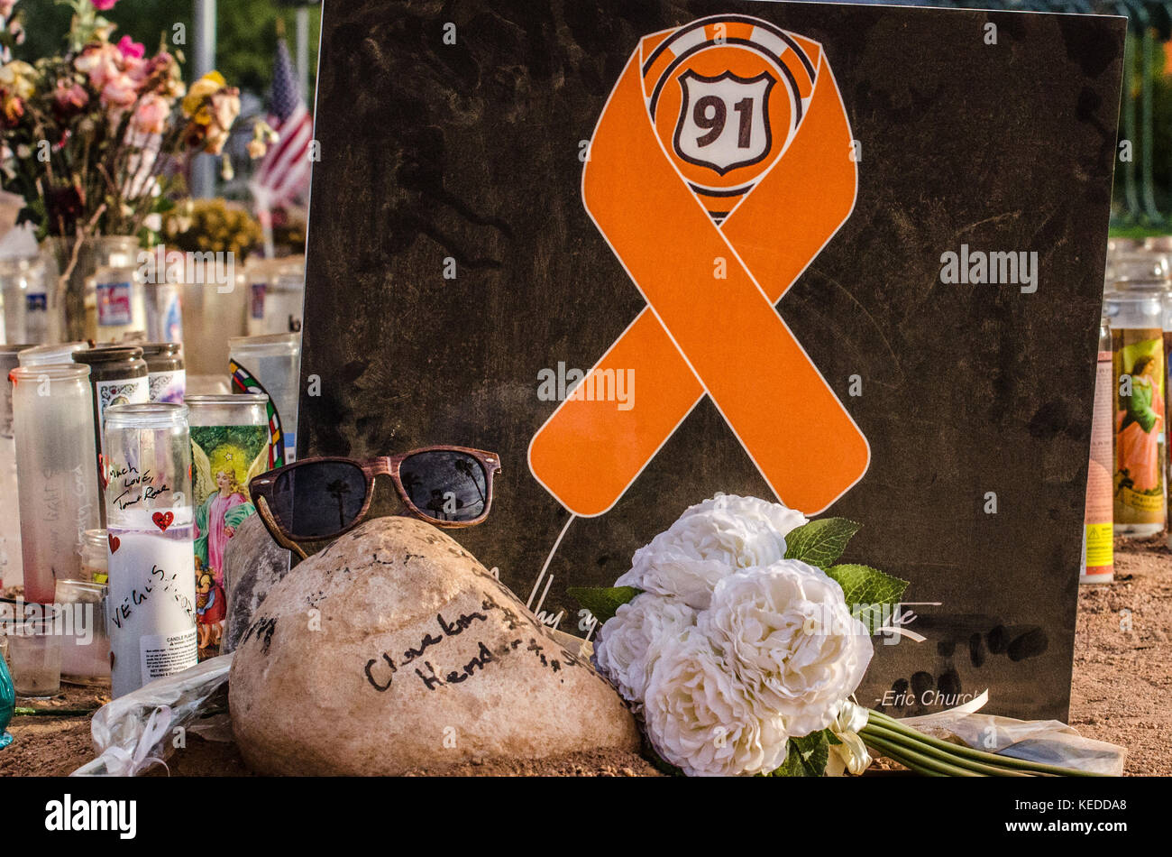 John and Claudia from Californial, survivors, left this memorial at the Welcome to Las Vegas Sign two weeks after the shooting in Las Vegas, NV. Stock Photo