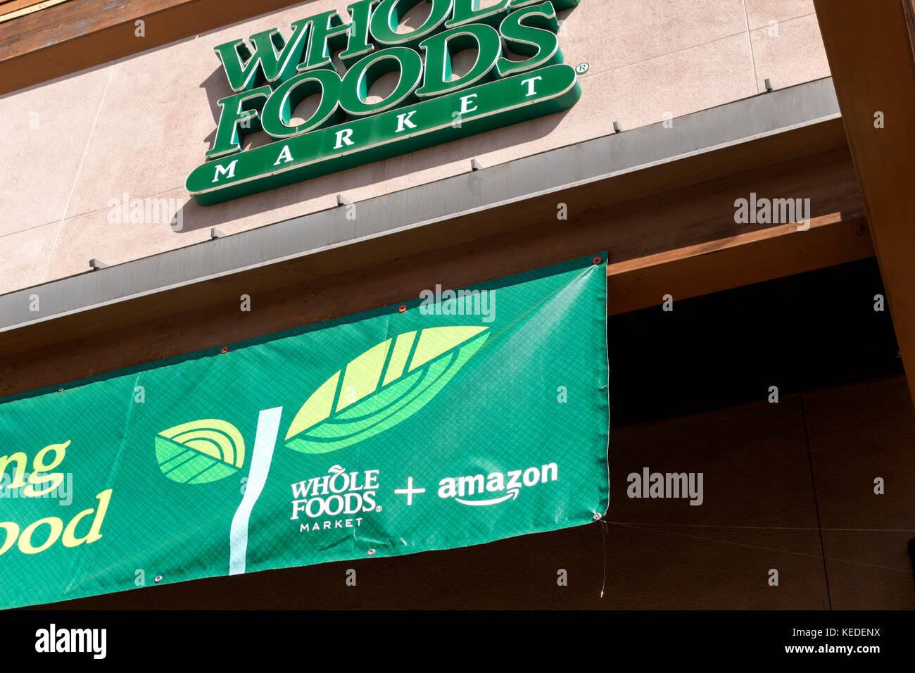 Amazon and Whole Foods sign on Cupertino Whole Foods store Stock Photo