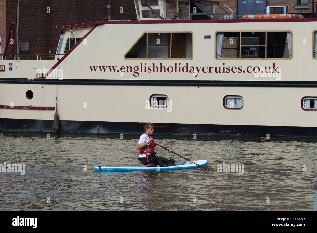 Paddle boarding in Gloucester Docks Stock Photo Alamy