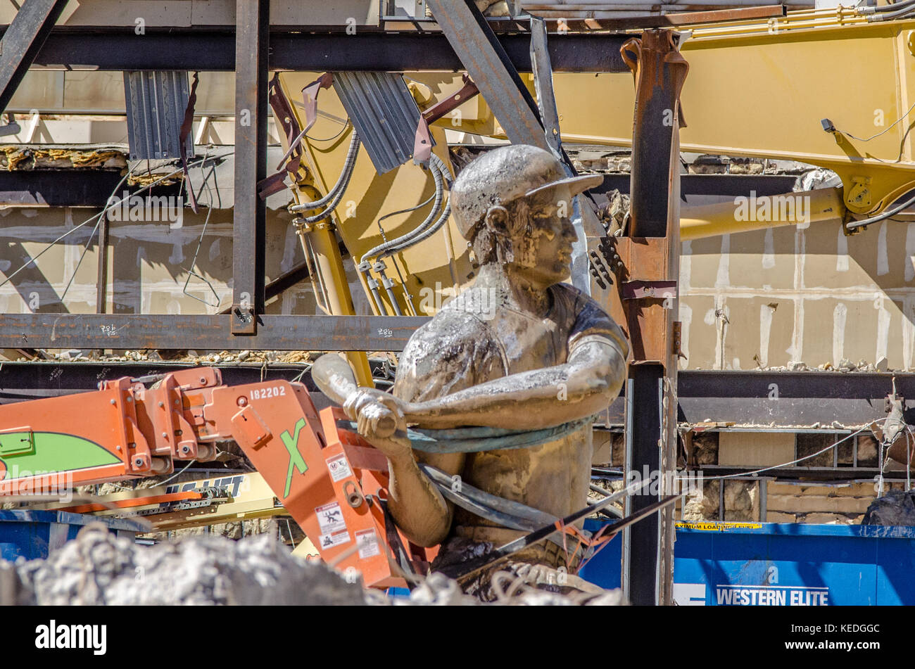 The baseball statue from the front of the old Las Vegas Club sits among the rubble of the block that was once home. Stock Photo