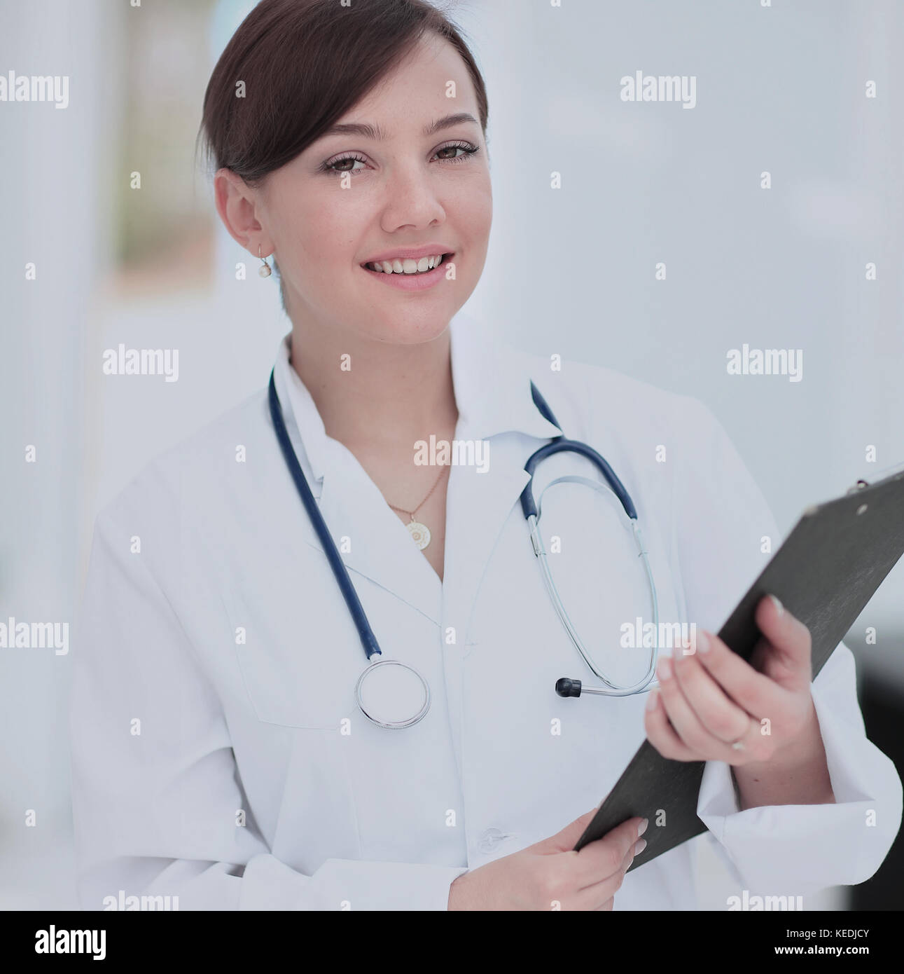 Medical physician doctor woman over blue clinic background Stock Photo ...