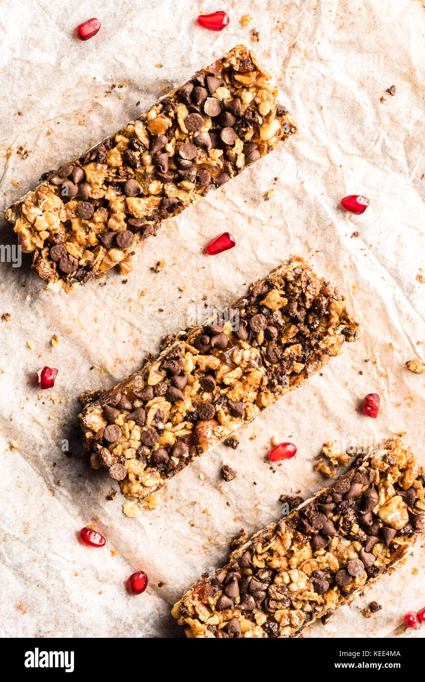 healthy homemade muesli bar with cereal, chocolate and pomegranate and