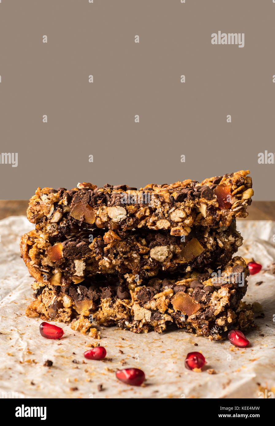 healthy homemade muesli bar with cereal, chocolate and pomegranate and
