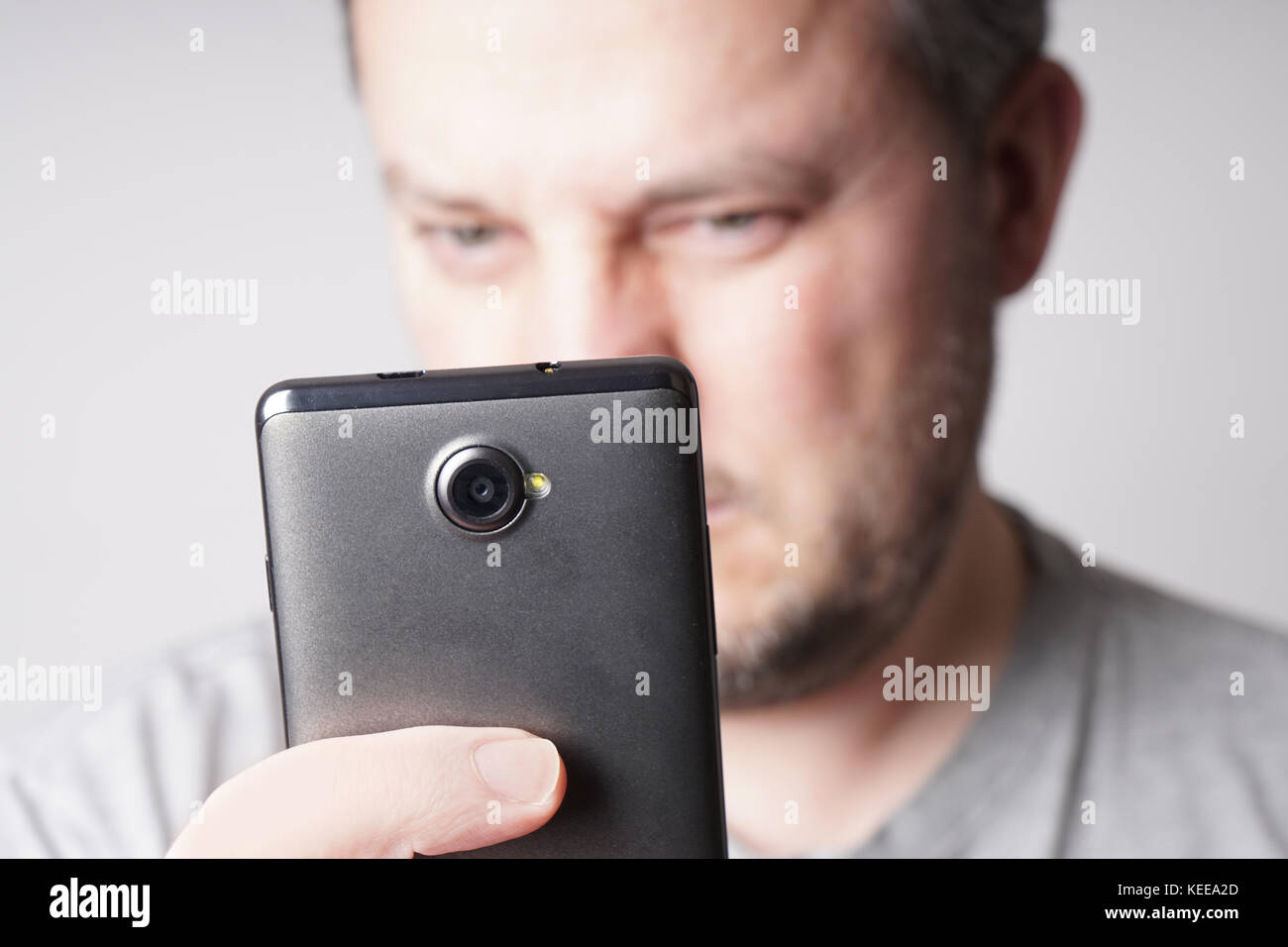 man taking selfie photo with smartphone Stock Photo