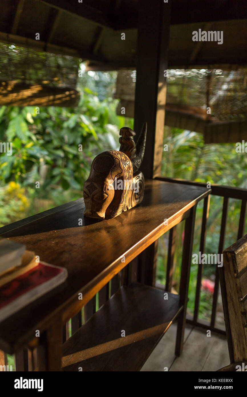 Cozy wooden terrace of a Balinese house, Indonesia. Interior details. Stock Photo