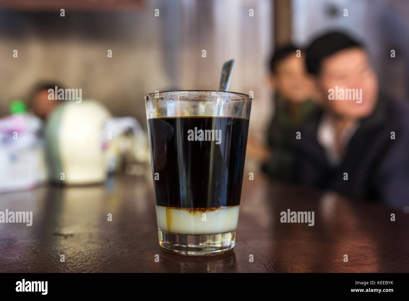 Glass of strong vietnamese filter dripping coffee Stock Photo