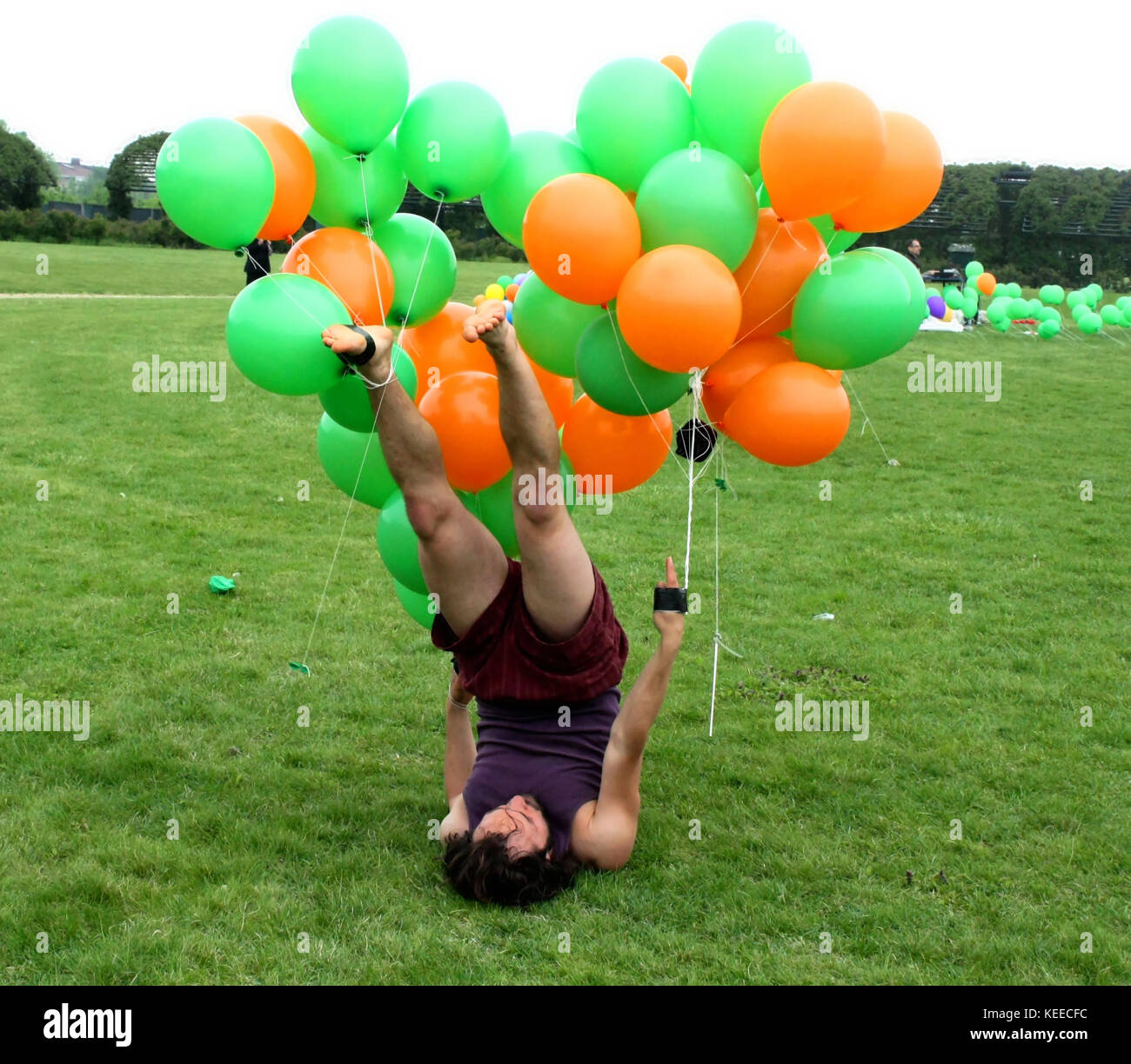 strange performance with colored balloons Stock Photo