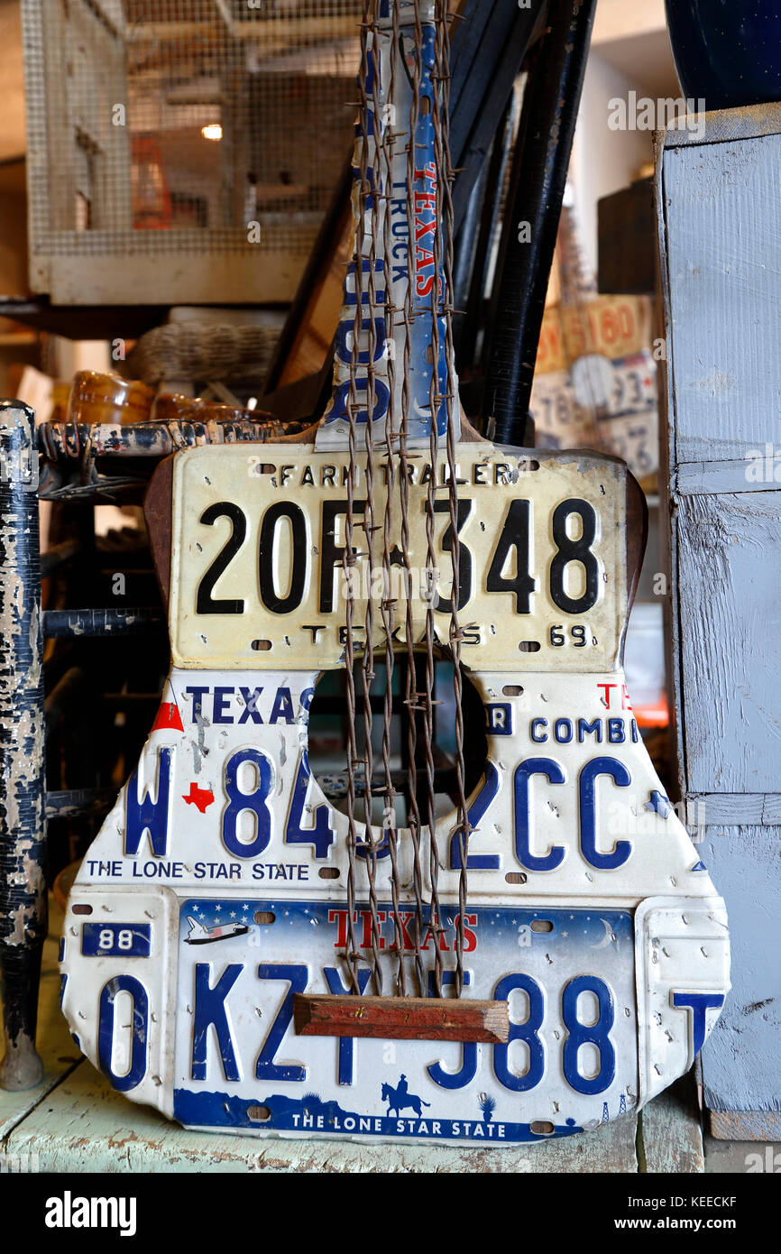 Guitar made with Texas license plates and barbed wire, Marigolds Farmhouse Funk & Junk (antiques store), Breckenridge, Colorado USA Stock Photo