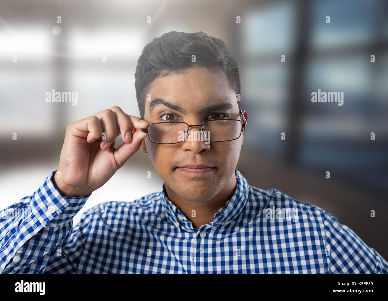 Digital composite of Businessman thinking with bright windows Stock ...