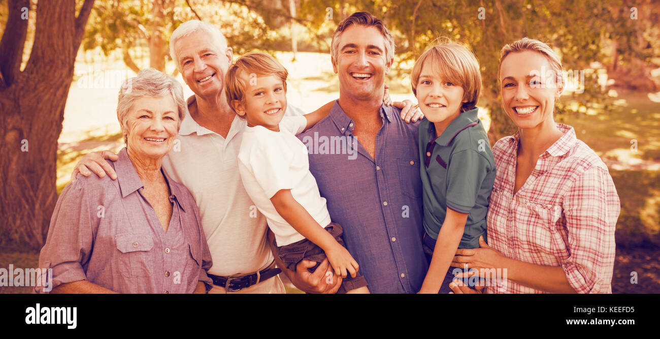 Happy family enjoying at park on sunny day Stock Photo - Alamy