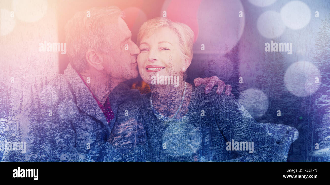 Couple kissing against tree hi-res stock photography and images - Alamy