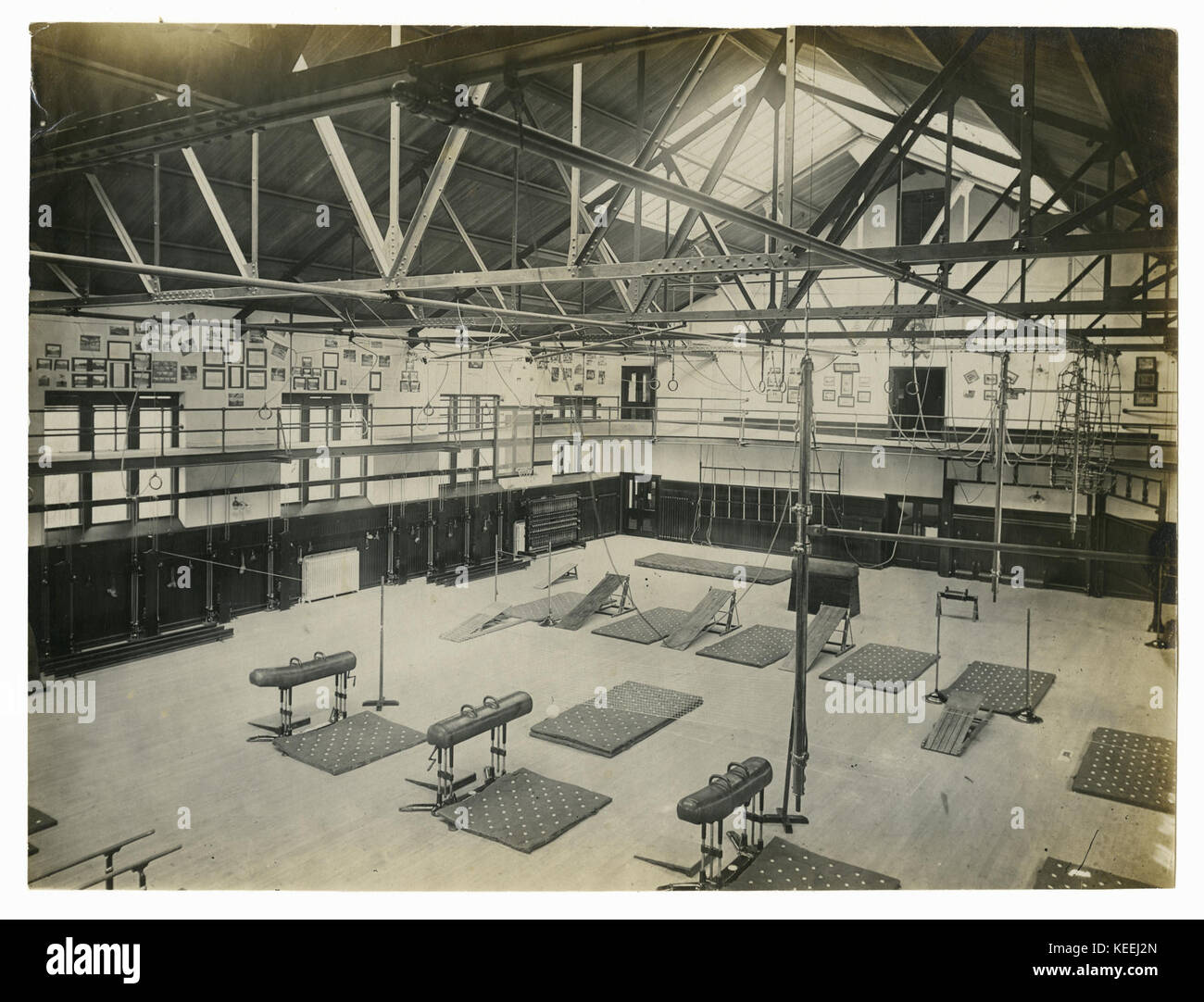 A.G. Spalding and Bros. exhibit of a model gymnasium. Looking east from the running Track, showing a new model and latest improved horizontal bar. Stock Photo