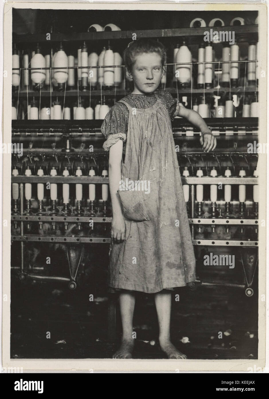 Addie Card, 12 years. Spinner in North Pownal Cotton Mill. Girls in mill say she is ten years. She admitted to me she was twelve; that she started during school vacation and now would  stay . Location  Vermont MET 0113 Stock Photo
