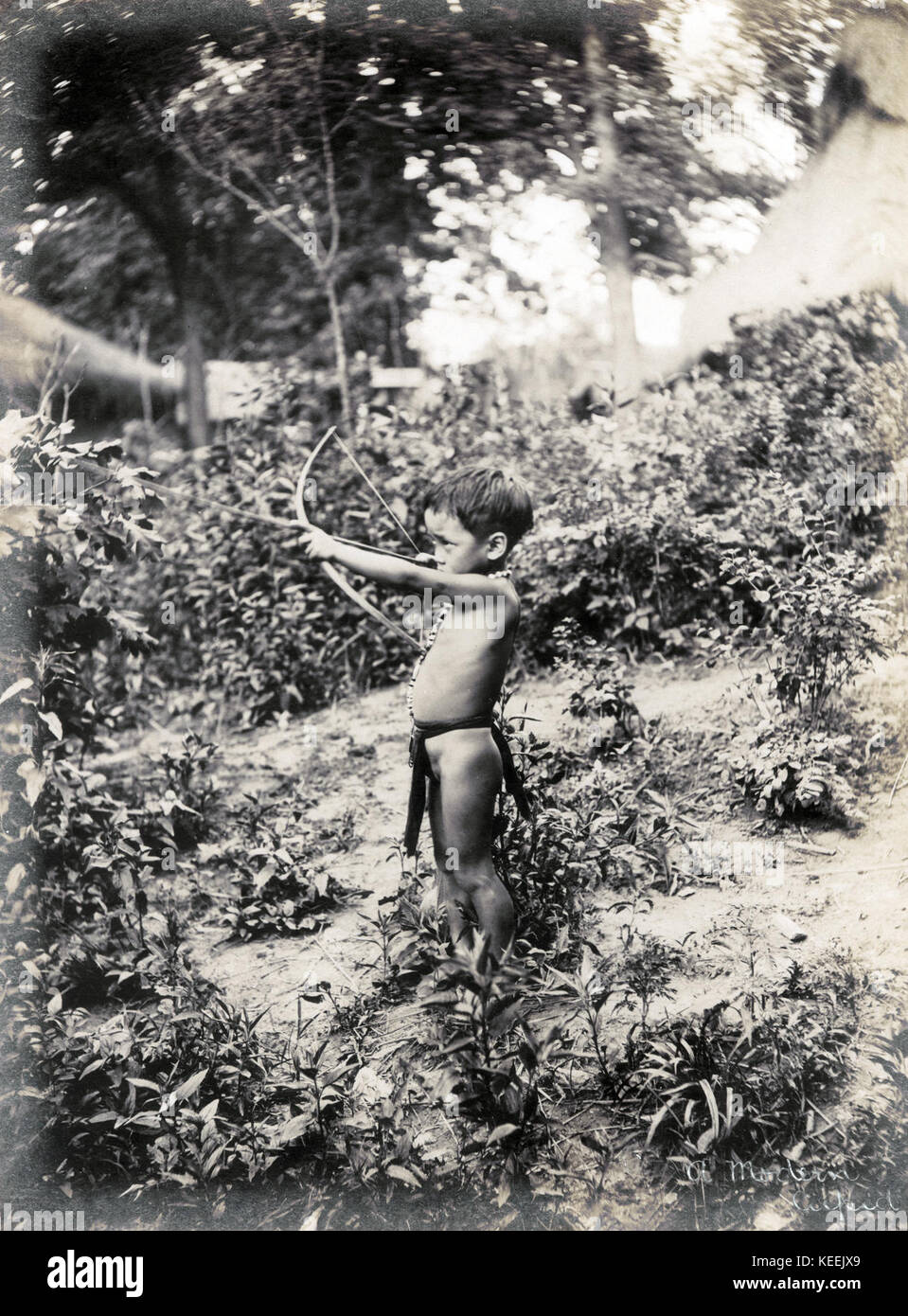A Modern Cupid.  (Probably Singwa, a Suyoc Igorrote boy as an archer in the Department of Anthropology at the 1904 World's Fair) Stock Photo