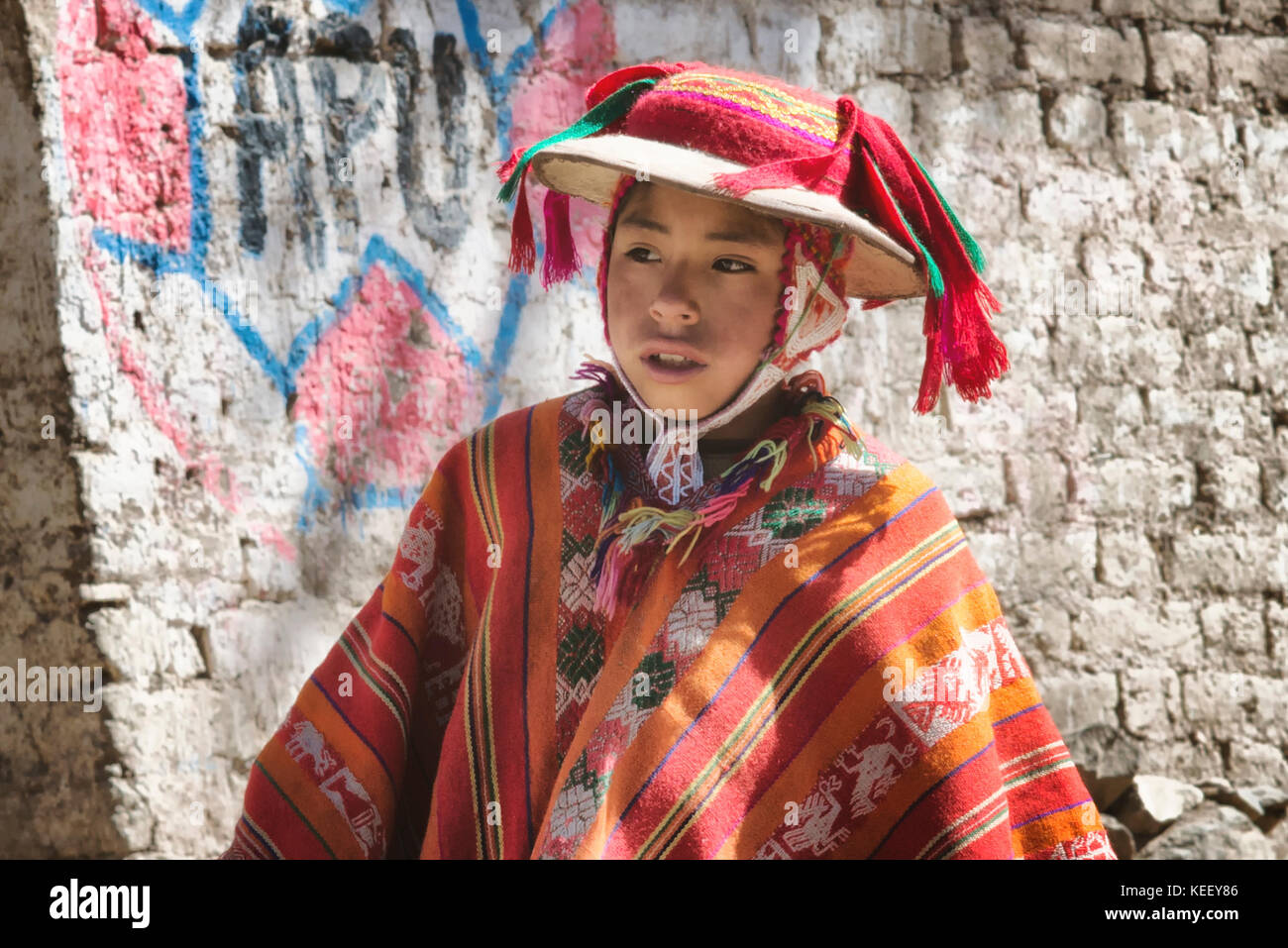 Peruvian boy dressed in colourful traditional handmade outfit. October 21, 2012 - Patachancha, Cuzco, Peru Stock Photo
