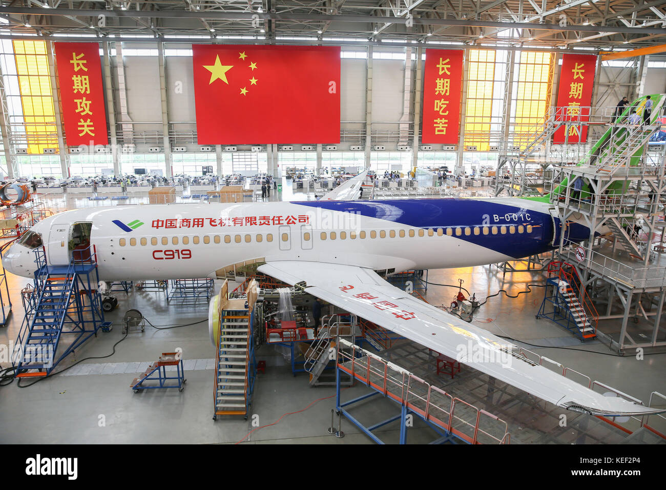Shanghai, China. 18th Oct, 2017. The C919 aircraft coded 102 is seen at the assembly line of Shanghai Aircraft Manufacturing Co., Ltd. of the Commercial Aircraft Corporation of China (COMAC) in Shanghai, east China, Oct. 18, 2017. Staff workers completed paint spraying for the jet on Oct. 11. Larger C919 jet is a narrow-body jumbo designed to rival the updated Airbus A320 and the new Boeing B737. Credit: Ding Ting/Xinhua/Alamy Live News Stock Photo