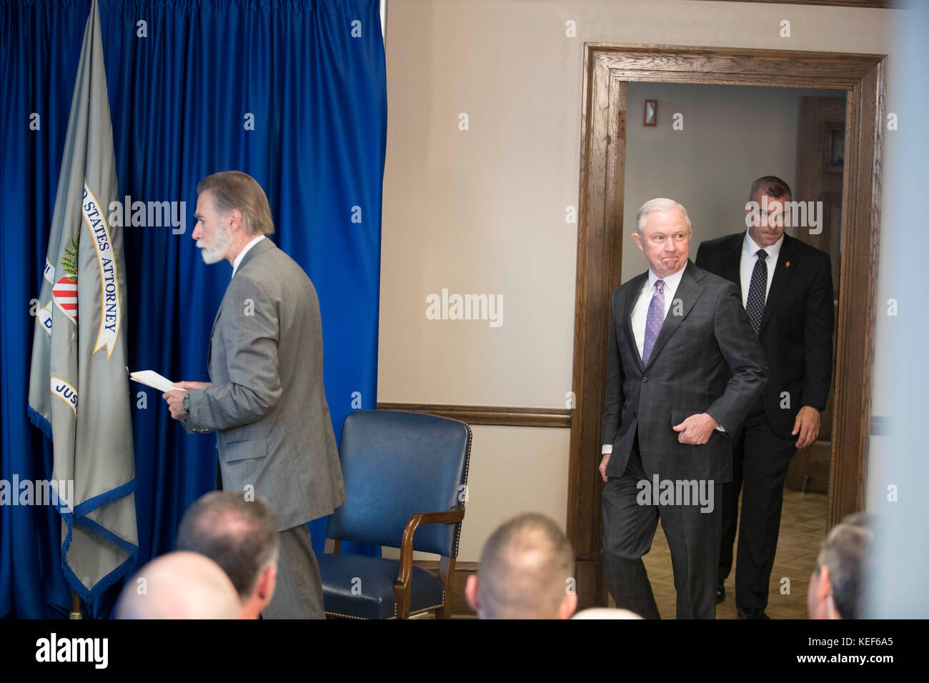 Austin, USA. 20th Oct, 2017. U.S. Attorney General Jeff Sessions (dark suit), accompanied by U.S. Attorney for the Western District of Texas, Richard Durbin, Jr.(gray suit), visits with U.S. attorneys to discuss the Trump administration's immigration policy in Austin, Texas. Sessions was met by a few dozen protesters but no incidents were reported. Credit: Bob Daemmrich/Alamy Live News Stock Photo